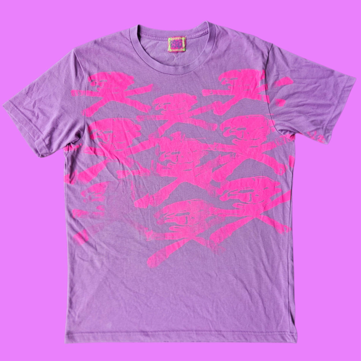Crazy print purple tee.