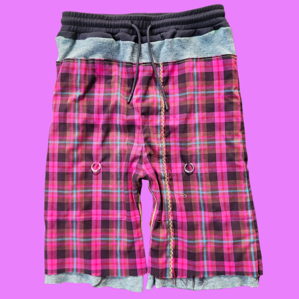 Purple pierced baggy shorts