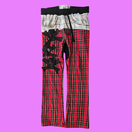 Hybrid plaid skull patch pants.